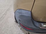 a close up of a car ' s rear bumper