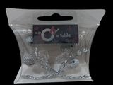 a clear plastic bag with a silver bird decoration on it