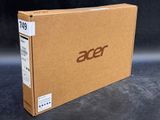 a box with the acer logo on it sitting on a table