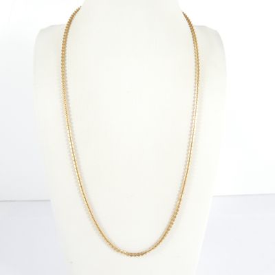 a gold chain necklace on a mannequin mannequin mannequin mannequin mannequin mannequin mannequin mannequin manne