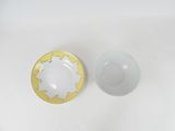 a small bowl and a small bowl on a white table