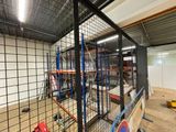 a picture of a large warehouse with a lot of shelves
