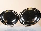 two plates that are sitting on a table