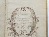an old book with writing on it sitting on top of a table