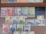 an image of a collection of stamps on a wooden table