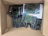 a cardboard box with a bunch of electronic components inside of it