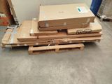 a pile of boxes on a pallet in a warehouse