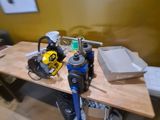a workbench with tools on top of it in a room