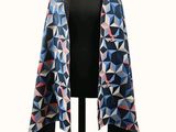 a black mannequin mannequin with a geometric pattern on it