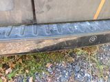 a close up of a black bumper on a truck