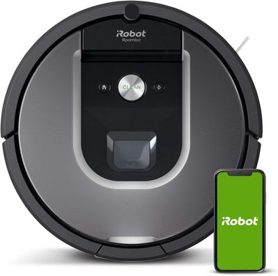 un robot aspirateur avec un smartphone à côté
