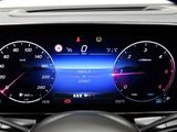 a close up of a car dashboard with a clock on it
