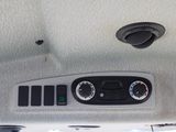 a close up of a car dashboard with the controls on