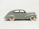 a toy car that is sitting on a white surface