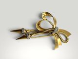 a pair of scissors with a bow on top of it