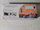 a box with a picture of a man sitting on a couch