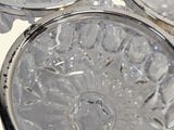 three glass dishes sitting on top of each other