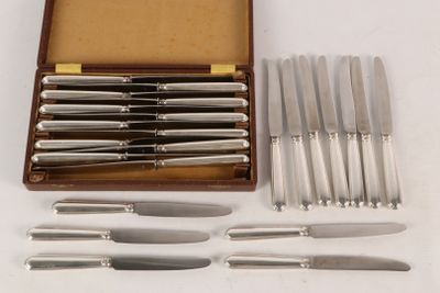 a box with a set of knives and knives in it
