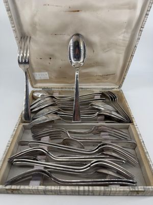 silverware in a silver case with spoons and forks in it