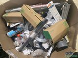 a cardboard box full of various items in it