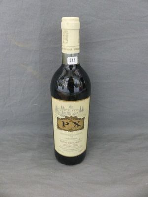 a bottle of wine that is sitting on a table
