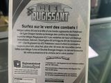 someone is holding up a card with a picture of a pokemon figure on it