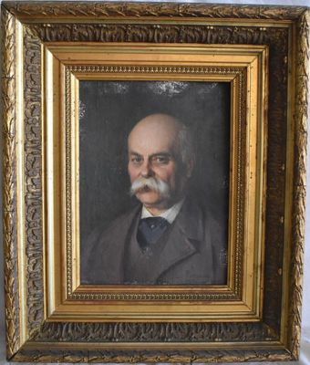 un tableau représentant un homme moustachu, dans un cadre doré