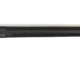 a close up of a black flashlight on a white background