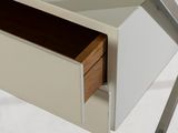 a close up of a drawer with a pair of scissors in it
