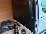 a white van with a wood panel in the back of it