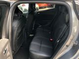 the back seats of a car are empty in the parking lot