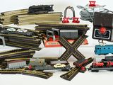 a lot of toy trains that are on the table