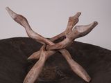 a close up of a piece of wood with antlers on it