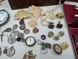 a table with a lot of jewelry on it