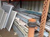 many different types of metal items in a warehouse