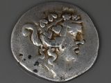 une vieille pièce d'argent sur laquelle est représenté un lion