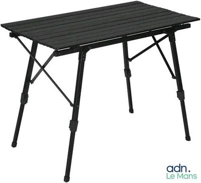 une table noire avec un plateau et des pieds noirs