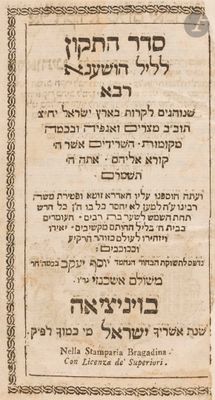 a close up of an old book with writing on it