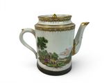 a tea pot that is sitting on a table