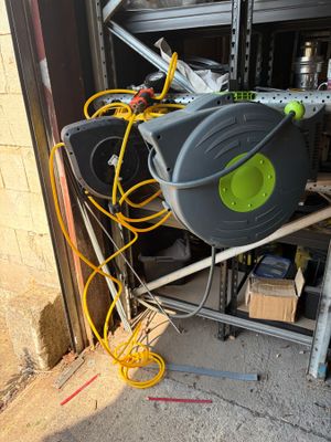 an image of a garage with a hose attached to it