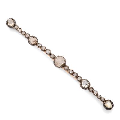 un bracelet en diamants et en or, signé Van Cleef