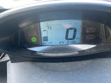 a close up of a speedometer on a motorcycle