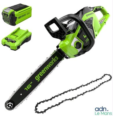 a greenworks corded chainsaw with two batteries and a battery