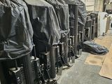 a man that is standing in front of a bunch of machines