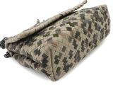 clutch bag made of woven fabric with a metal handle