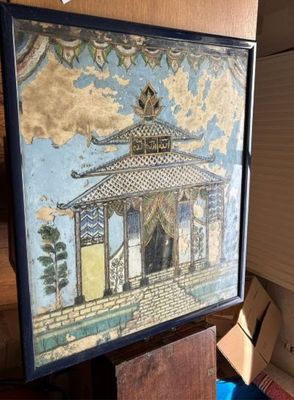 la photo d'une photo d'un bâtiment posé sur une table