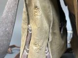 a close up of a bag that has a handle on it
