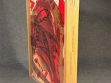 an image of a wooden box with a painting on it