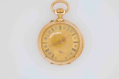 yellow gold pocket watch with roman numerals and roman numerals on the face