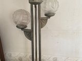 a lamp that is on top of a wooden table